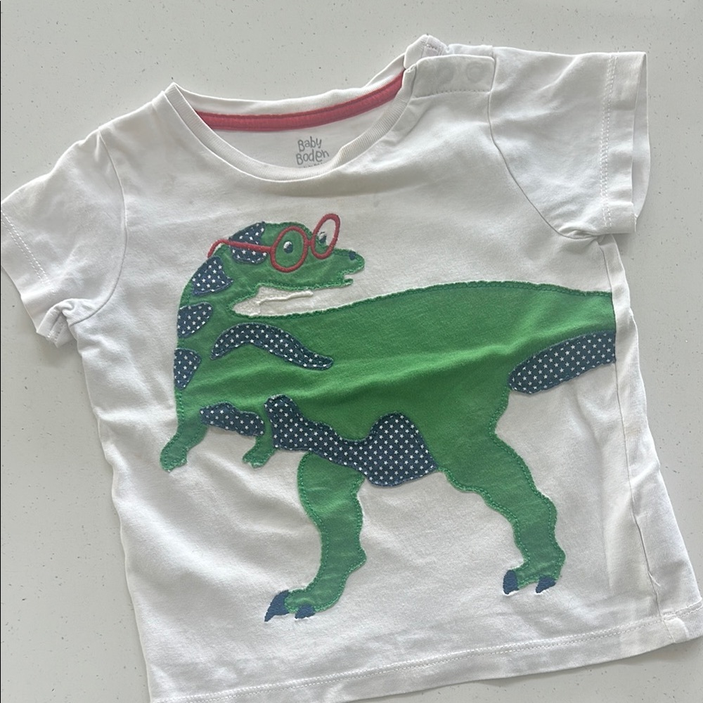 Baby Boden Green Dinosaur Tee, star details in navy areas, White Short Sleeve